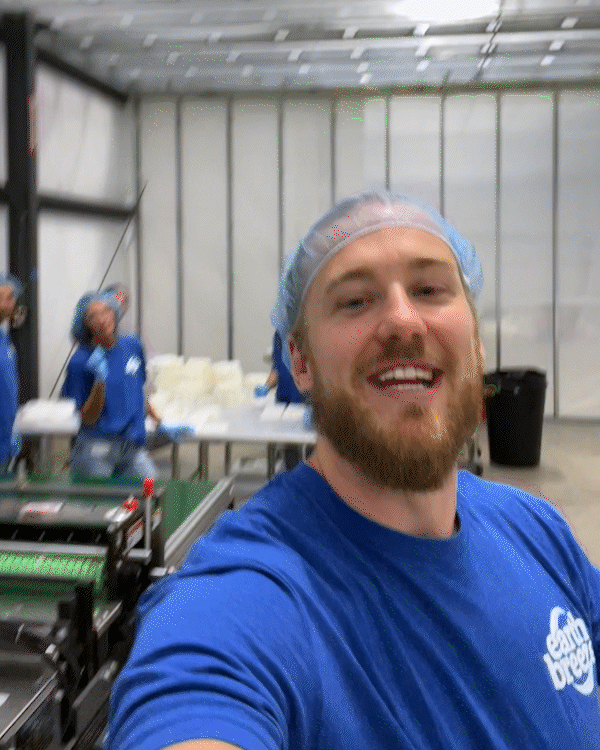 Jon, founder of Earth Breeze, on the factory floor